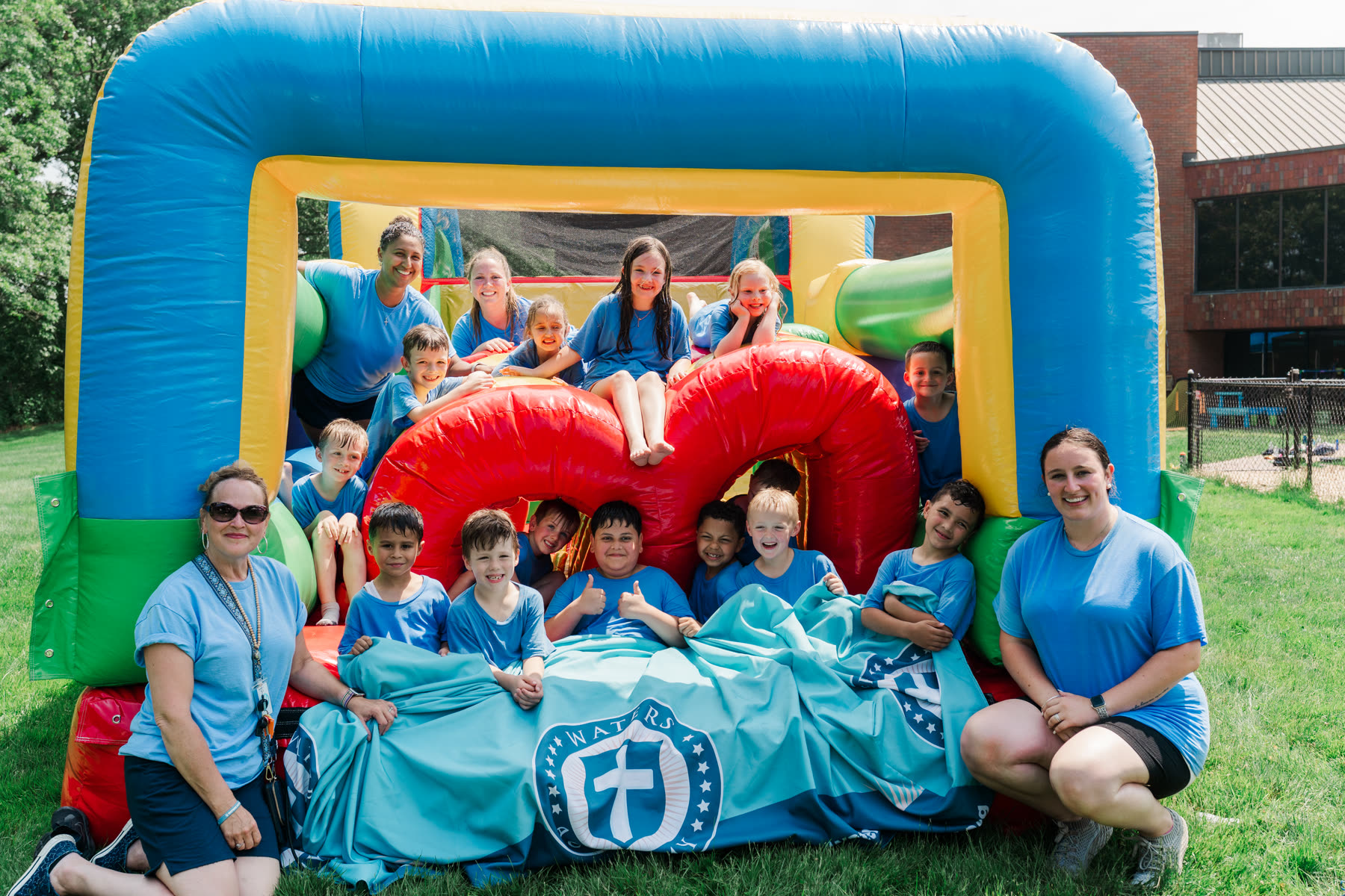 Waters Academy class group photo at an outdoor event